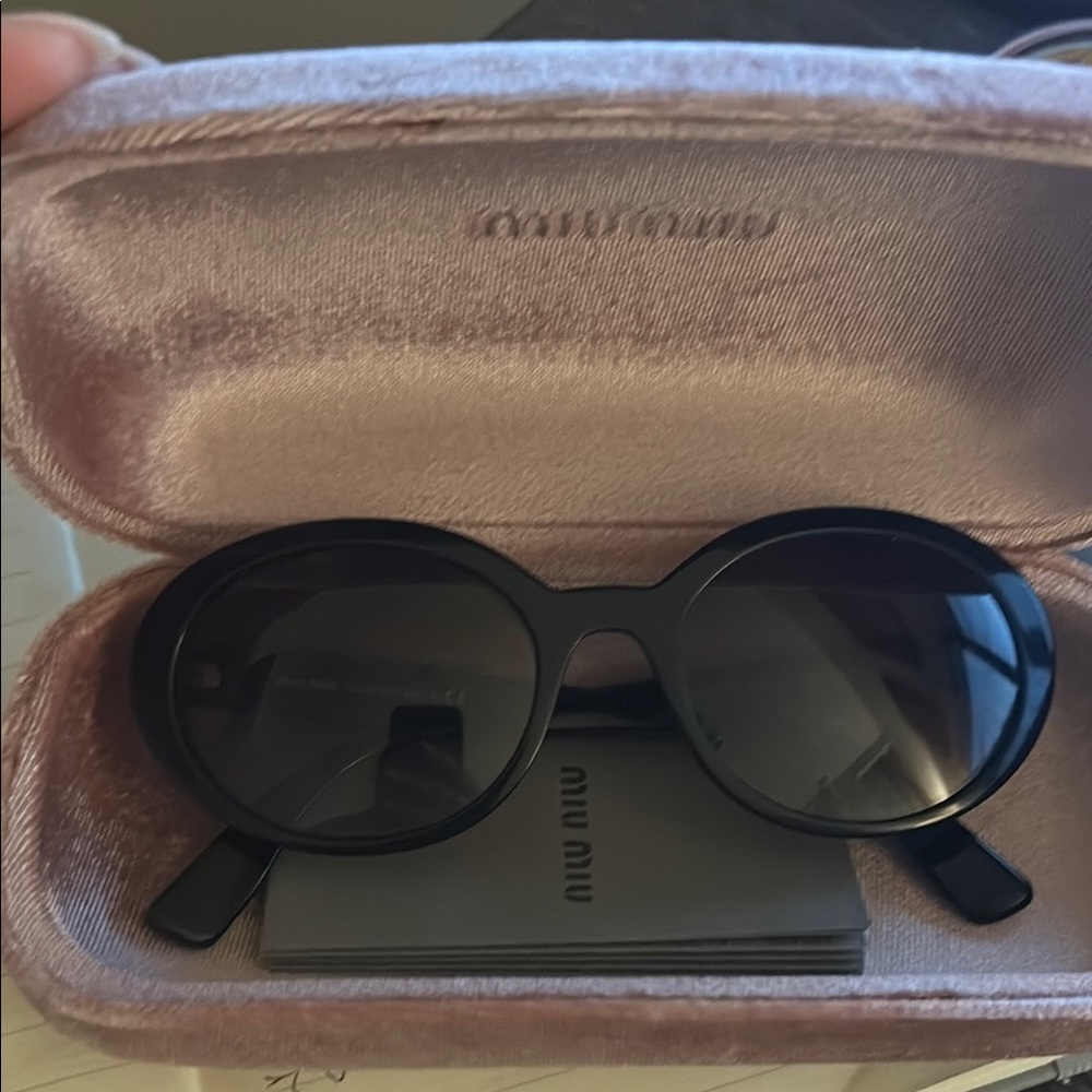 Miu Miu Black Oval Sunglasses Classic Design
